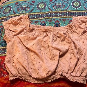 Cute size 8 crop top. With eyelet detail . It’s an 8 but it fits like a small.